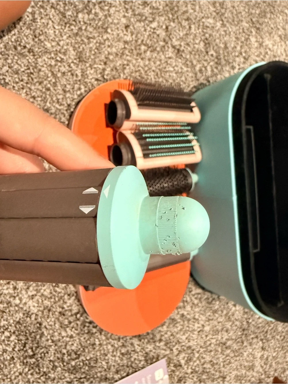 Dyson multi-attachment styler in aqua, coral and rose gold